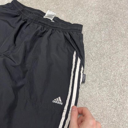 Vintage Y2K Adidas tracksuit bottoms black Loose leg mesh lined side stripe track pants