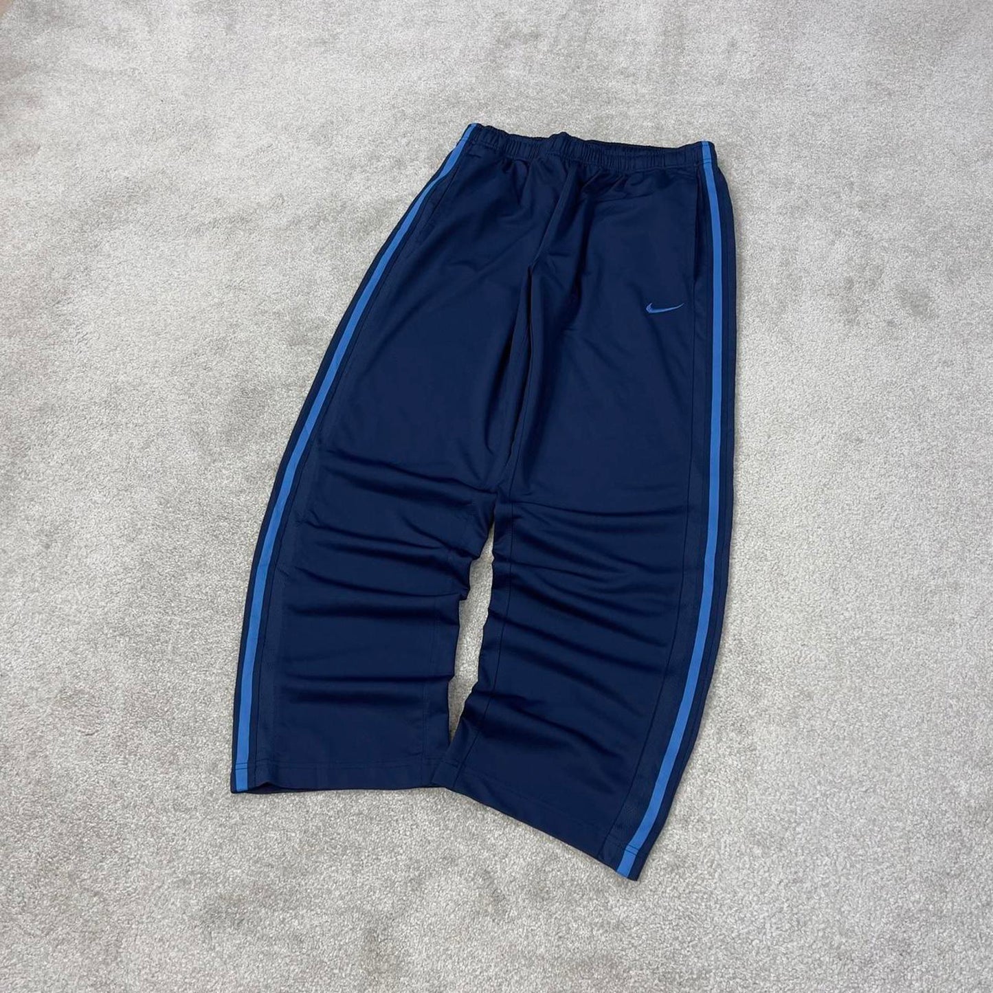 Baggy Nike Trackies Large Navy loose wide leg y2k style joggers embroidered logo side stripe design