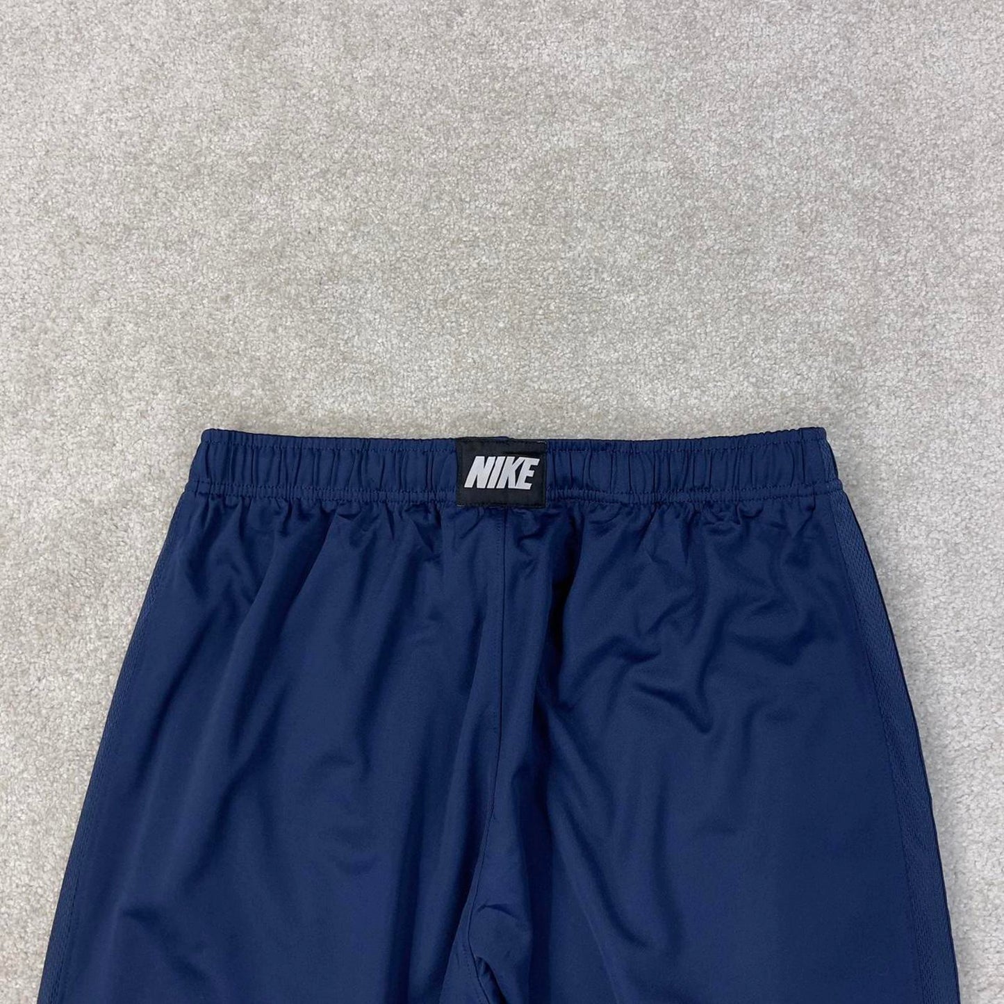 Baggy Nike Trackies Large Navy loose wide leg y2k style joggers embroidered logo side stripe design