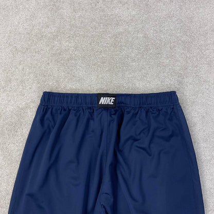 Baggy Nike Trackies Large Navy loose wide leg y2k style joggers embroidered logo side stripe design