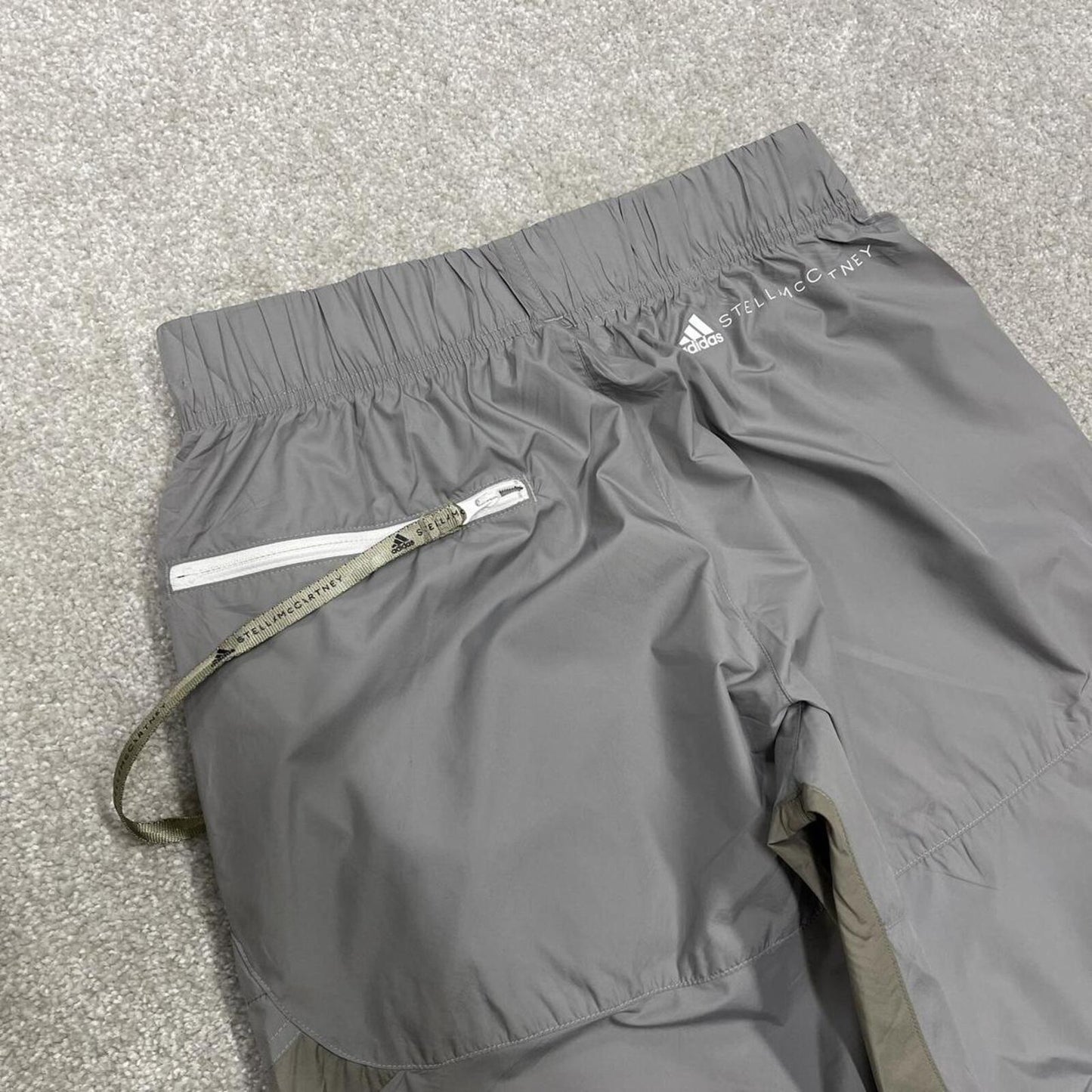 Adidas Stella McCartney tracksuit bottoms grey khaki Loose paneled unlined track pants adjustable
