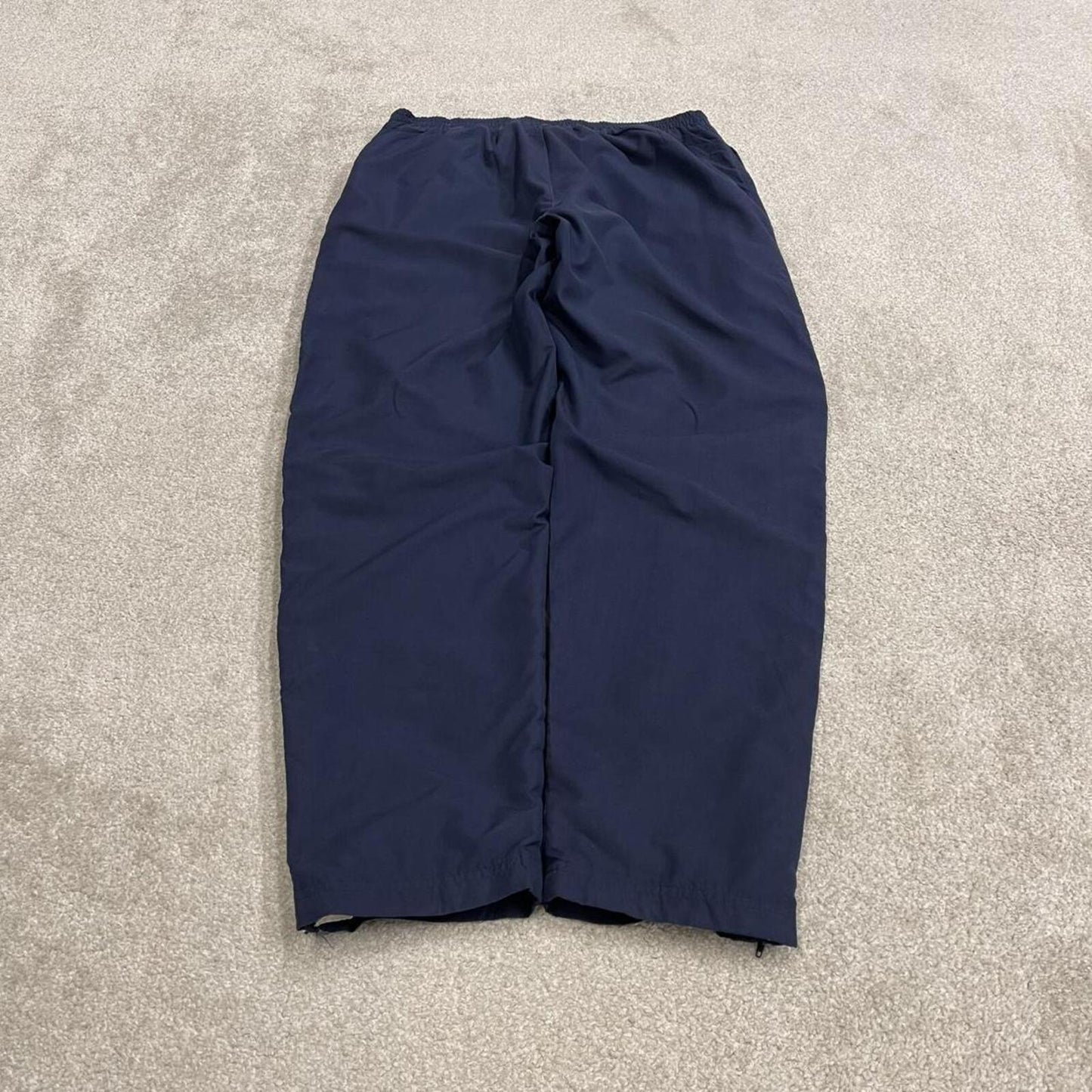 Vintage Reebok tracksuit bottoms loose navy Floaty embroidered mesh lined track pants