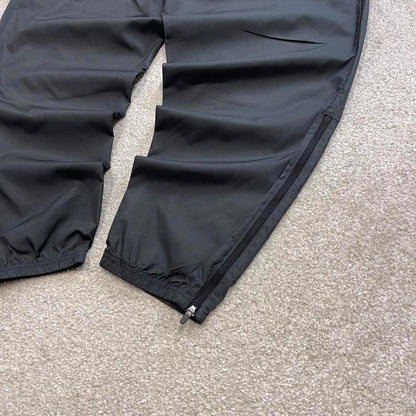 Grey Nike trackies XL loose y2k style joggers print Swoosh logo gym wear track pants