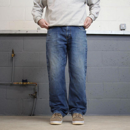 Vintage blue Carhartt jeans W36L32 relaxed denim 90s style skater jeans patch logo