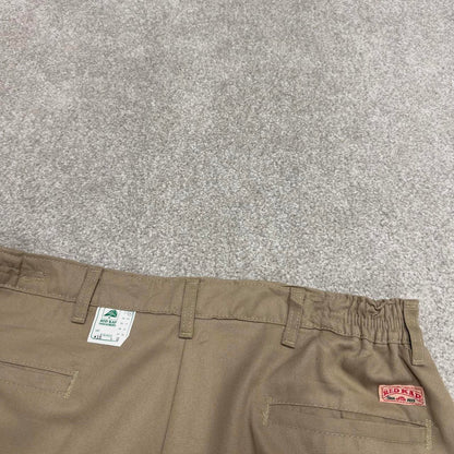 Y2k baggy work pants loose beige Chino style skate trousers Red Kap workwear patch logo