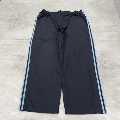 Vintage Womens navy Adidas joggers 22 y2k style sportswear track pants side stripe design