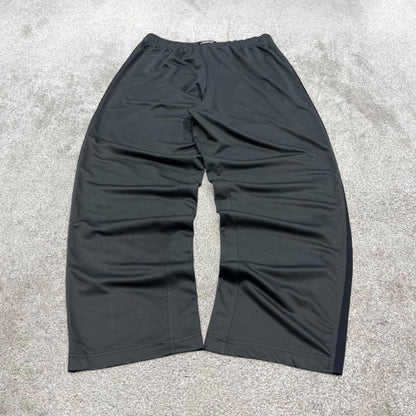 Grey baggy Nike trackies L loose y2k style joggers embroidered Swoosh logo track pants side stripes