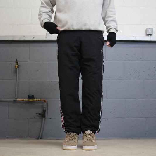 Vintage Champion tracksuit bottoms y2k style black joggers embroidered side stripe track pants