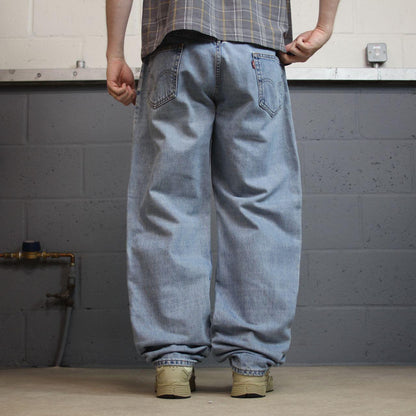 Levi’s baggy jeans Y2K W36L34 blue Levi’s 550 relaxed fit surf style pants red tab logo