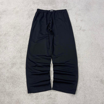 Baggy Nike Trackies Large Black y2k 00s style loose wide leg joggers embroidered logo side stripe