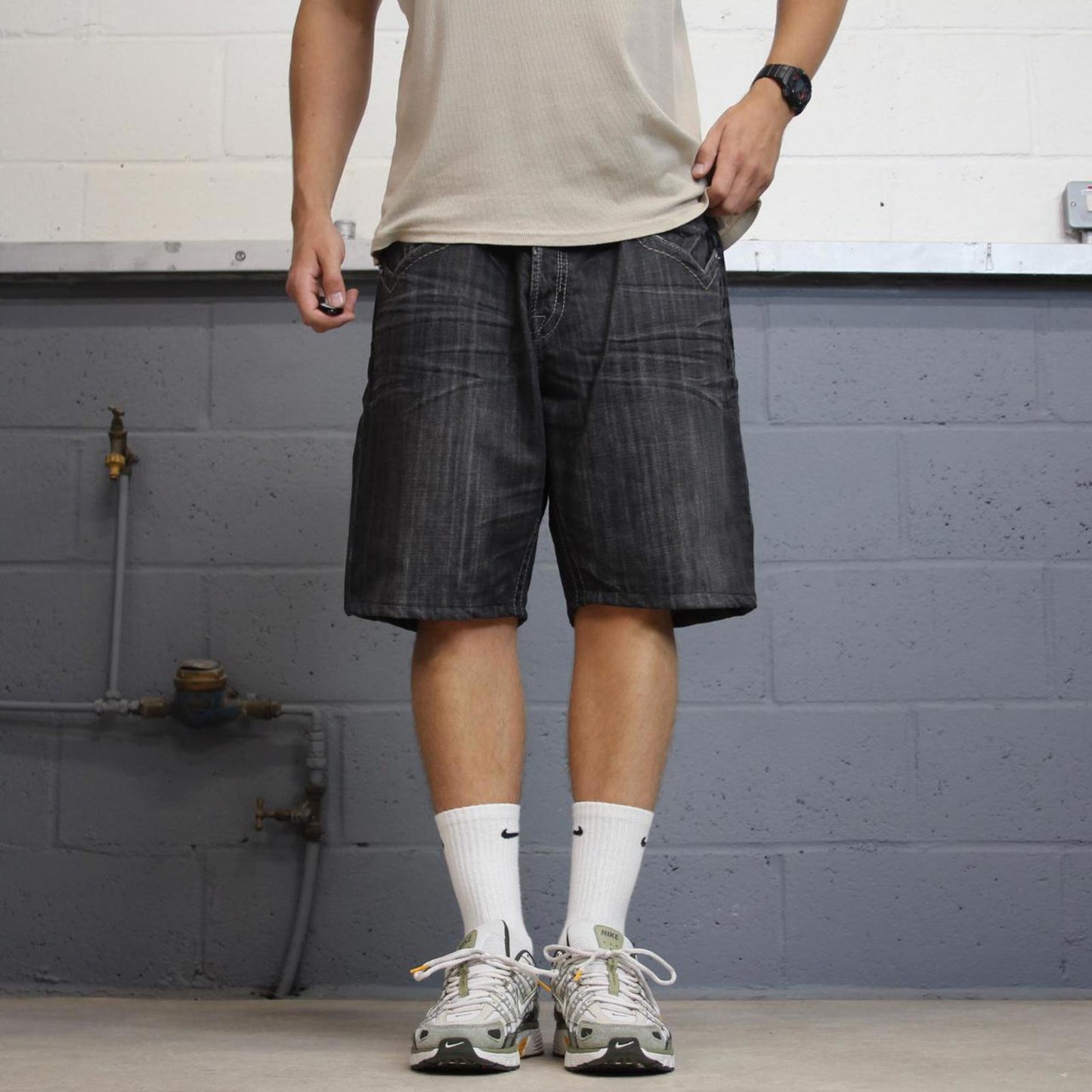Black embroidered MEK DNM jorts W38