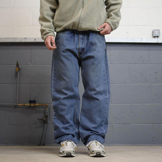 Vintage Y2K Levi’s 505 jeans blue Straight leg 00s style denim pants red tab logo