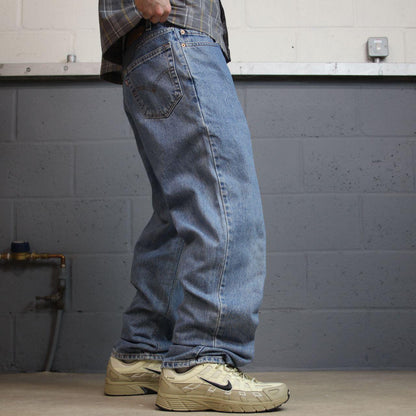 Levi’s 550 relaxed jeans y2k W34L32 blue straight leg denim red tab logo pants
