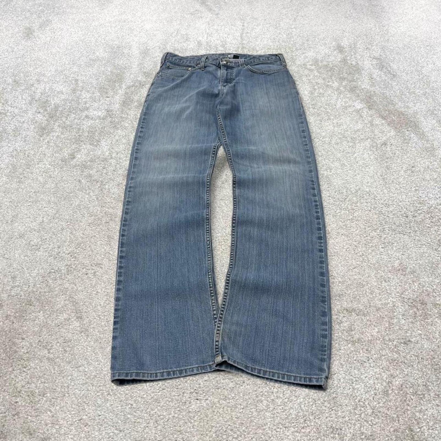 Carhartt work jeans relaxed fit blue Denim workwear pants white patch logo