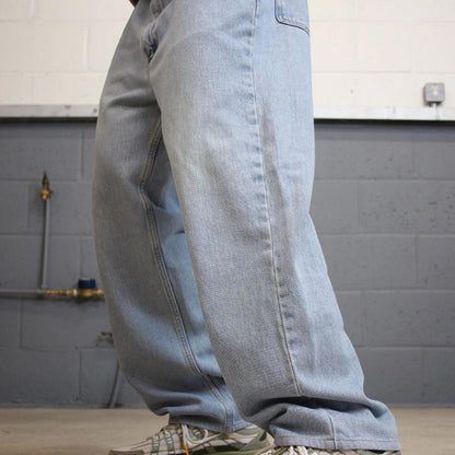 Vintage Y2K Levi’s 550 jeans blue Loose straight leg 00s style denim pants red tab logo