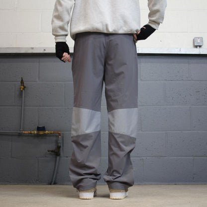 00s Under Armour tracksuit bottoms y2k M loose grey joggers embroidered logos gym wear trackies