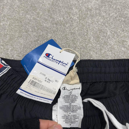 Vintage Champion tracksuit bottoms y2k style black joggers embroidered side stripe track pants