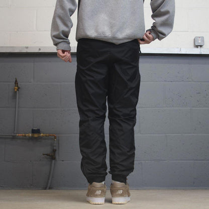 Vintage y2k Nike tracksuit bottoms black Soft shell mesh lined embroidered logo track pants