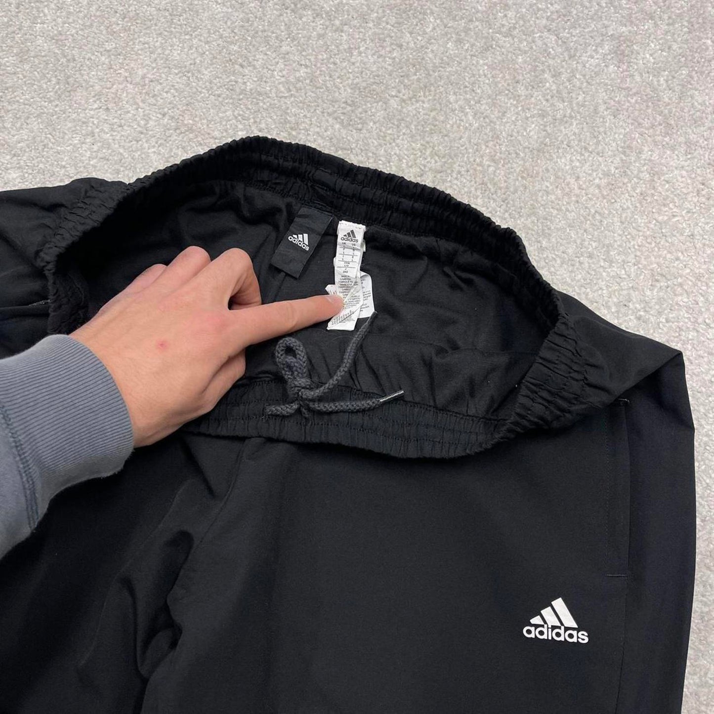 Black Adidas trackies Large y2k loose style sportswear track pants embroidered side stripe design