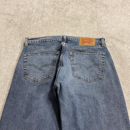 Y2K Levi’s 505 jeans straight leg washed blue Straight fit 5 pocket pants red tab logo