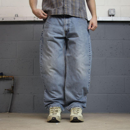 Levi’s 550 jeans Y2K blue relaxed denim Levi’s loose leg 2000s style pants red tab logo