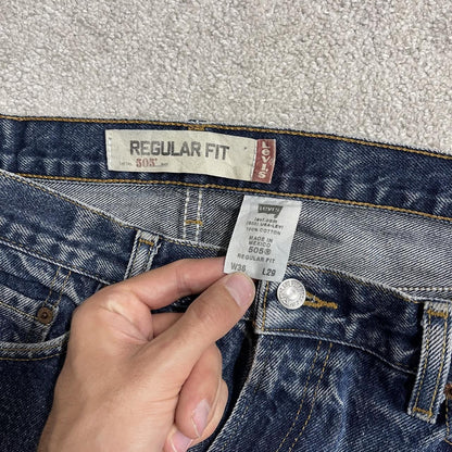 Y2K Levi’s 505 jeans blue starched denim W34L29 100% cotton straight fit 5 pocket belt loops red tab