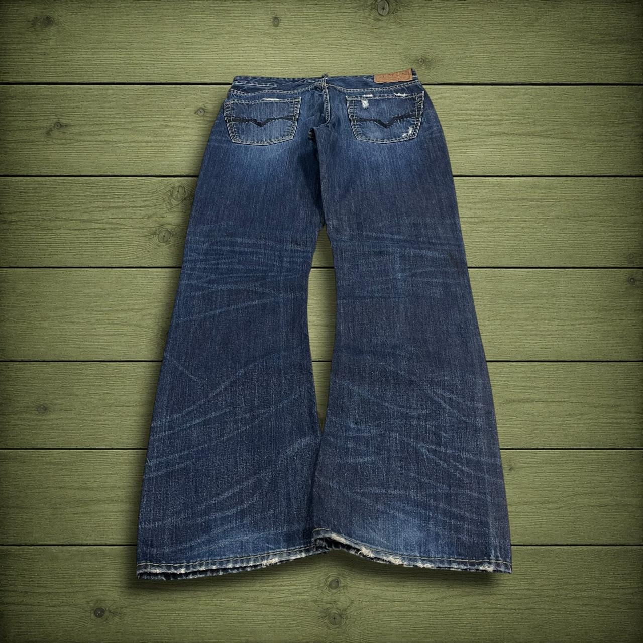 Y2K Guess bootcut jeans W33L34 blue ripped denim Loose bootcut pants with stitch design and pockets