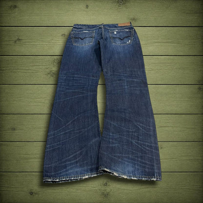 Y2K Guess bootcut jeans W33L34 blue ripped denim Loose bootcut pants with stitch design and pockets