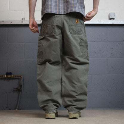 Green Carhartt carpenter jeans baggy W34L30 Loose fit American workwear skate pants utility pockets