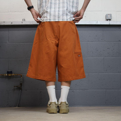 Orange baggy Dickies carpenter chino shorts Chino style skater shorts long wide leg festival