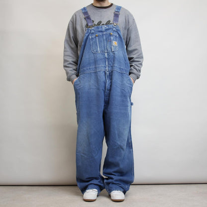 Blue denim Carhartt overalls W54
