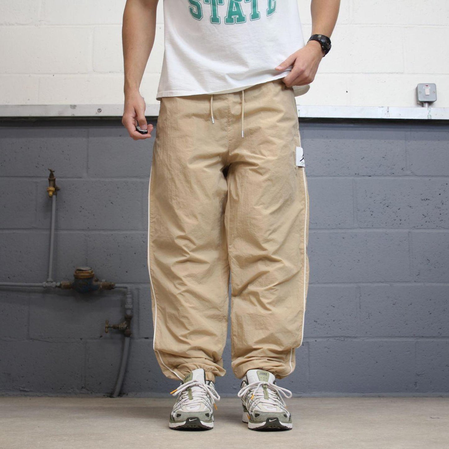 Air Jordan Trackies Large beige mesh lined loose sportswear floaty leg joggers