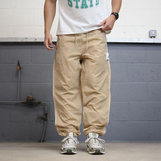 Air Jordan Trackies Large beige mesh lined loose sportswear floaty leg joggers
