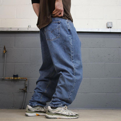 Y2K Levi’s 550 jeans tapered leg blue Loose relaxed fit denim pants red tab logo