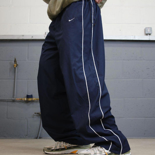 Vintage y2k baggy Nike tracksuit bottoms navy Loose wide-leg lined embroidered striped track pants