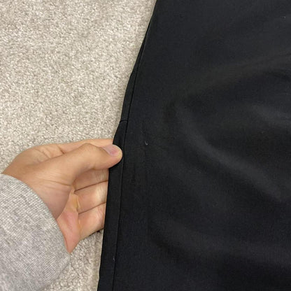 Nike tracksuit bottoms loose fit black Lightweight floaty swoosh logo track pants