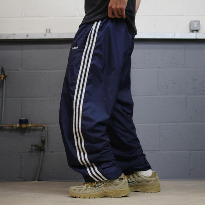 Vintage Y2K baggy Adidas tracksuit bottoms navy Loose-leg embroidered lined side stripe track pants