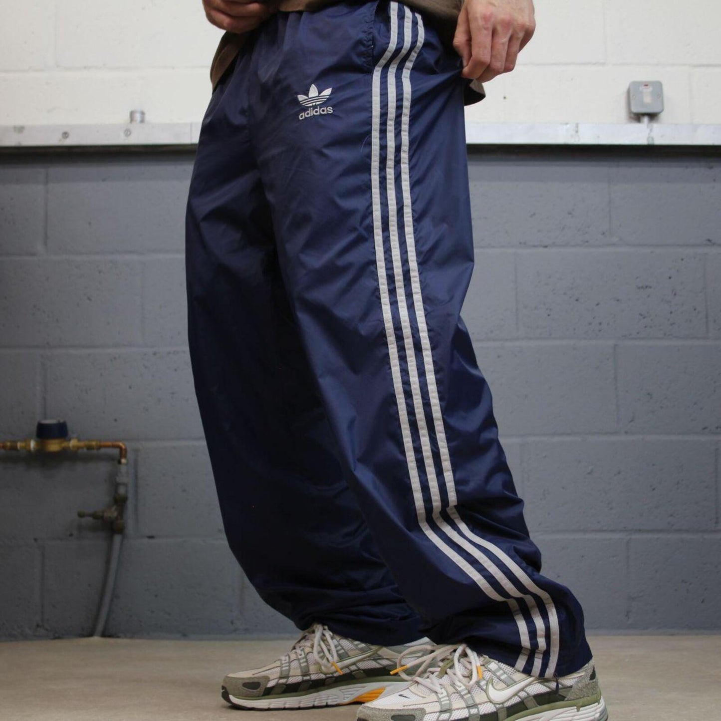 Adidas tracksuit bottoms loose leg navy Vintage mesh lined embroidered side stripe track pants