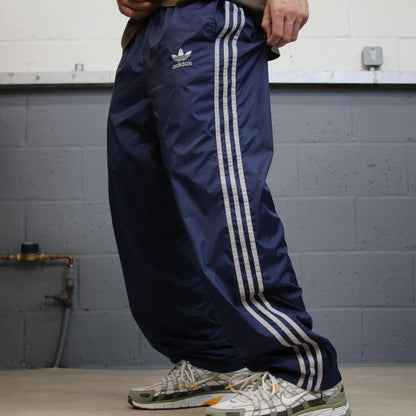 Adidas tracksuit bottoms loose leg navy Vintage mesh lined embroidered side stripe track pants