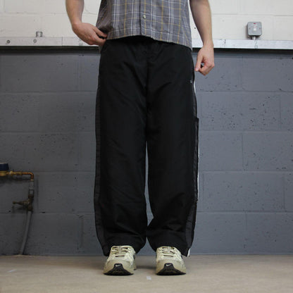 Y2K Champion tracksuit bottoms loose black Loose leg lined 2000s style casual track pants