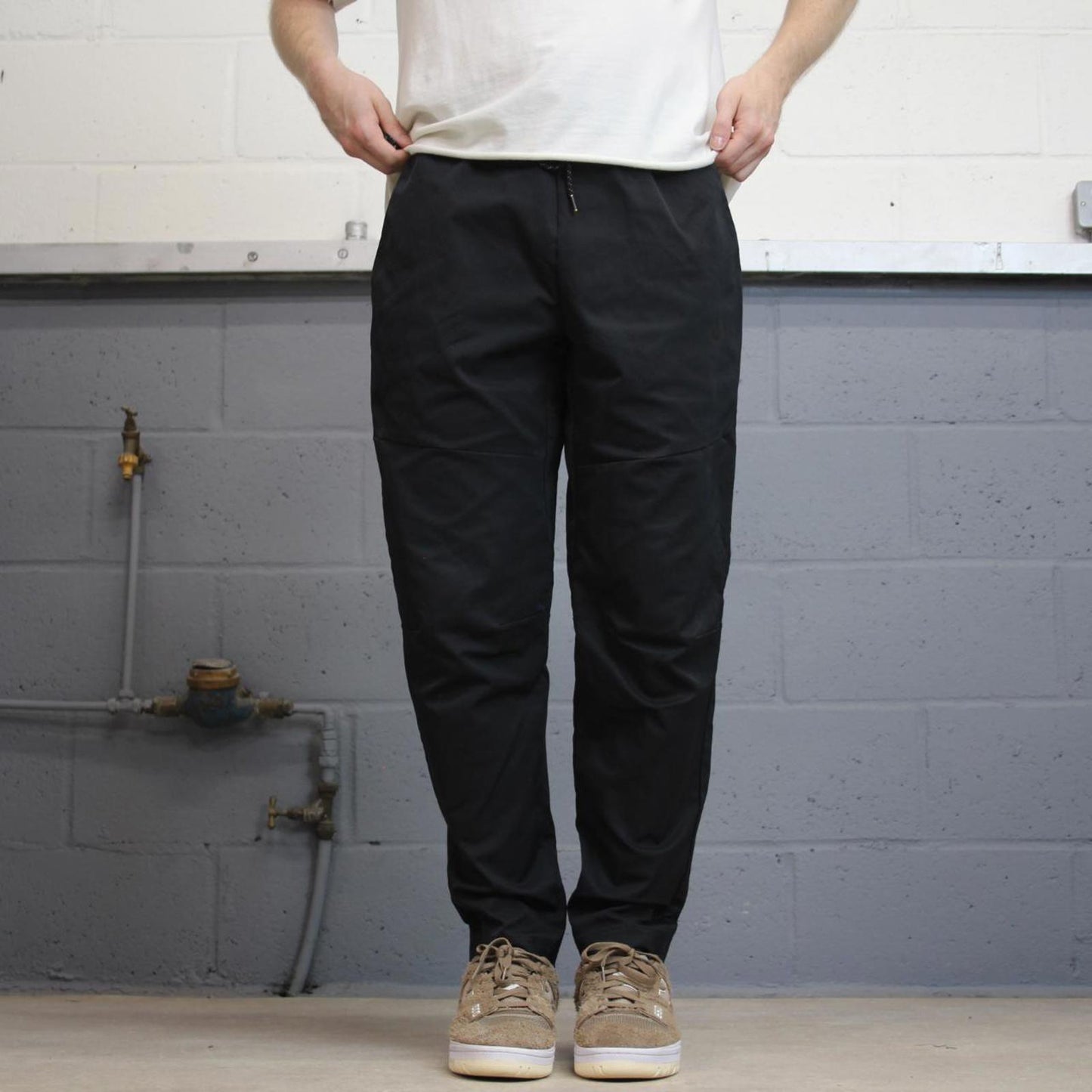 Black Nike Trackies M loose track pants print logo