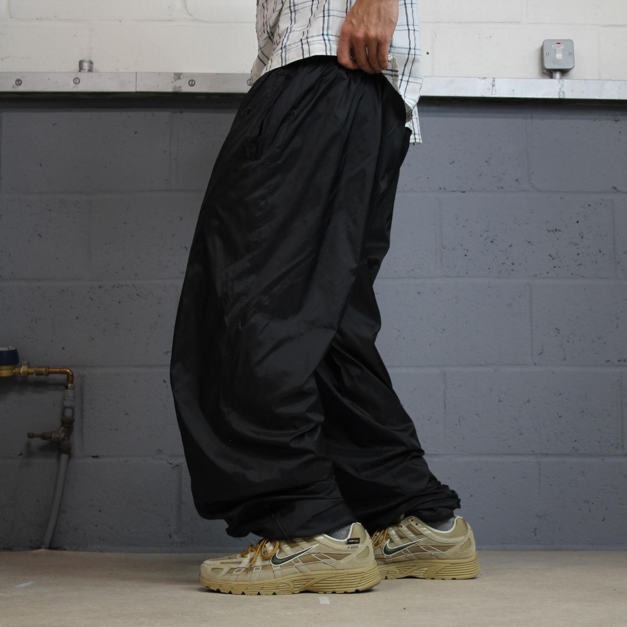 Champion baggy tracksuit bottoms black embroidered Loose mesh lined casual track pants