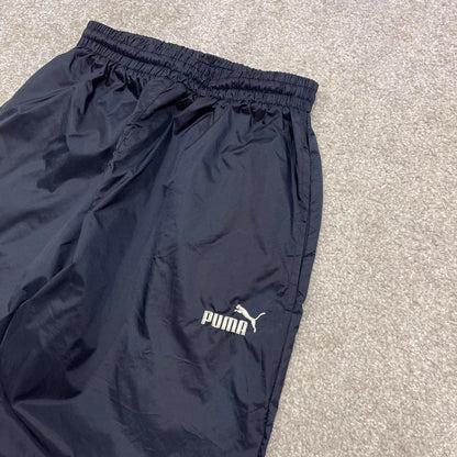 Vintage y2k Puma tracksuit bottoms navy Loose embroidered track pants ankle zips