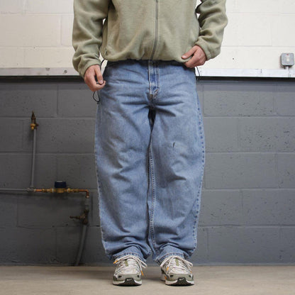 Y2K baggy Levi’s 560 jeans wide leg blue Loose comfort fit denim pants red tab logo