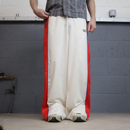 Vintage y2k baggy Adidas tracksuit bottoms beige Wide leg embroidered side stripe 2000s track pants