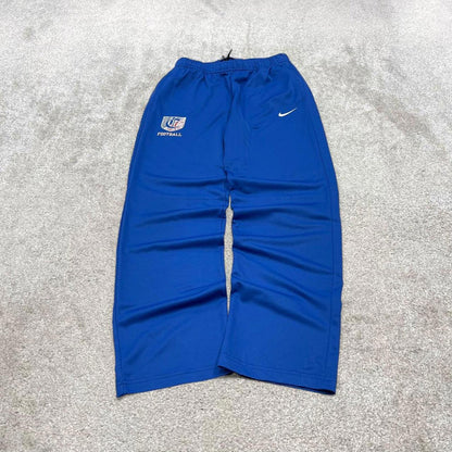 Vintage y2k Nike tracksuit bottoms blue Floaty swoosh logo running track pants