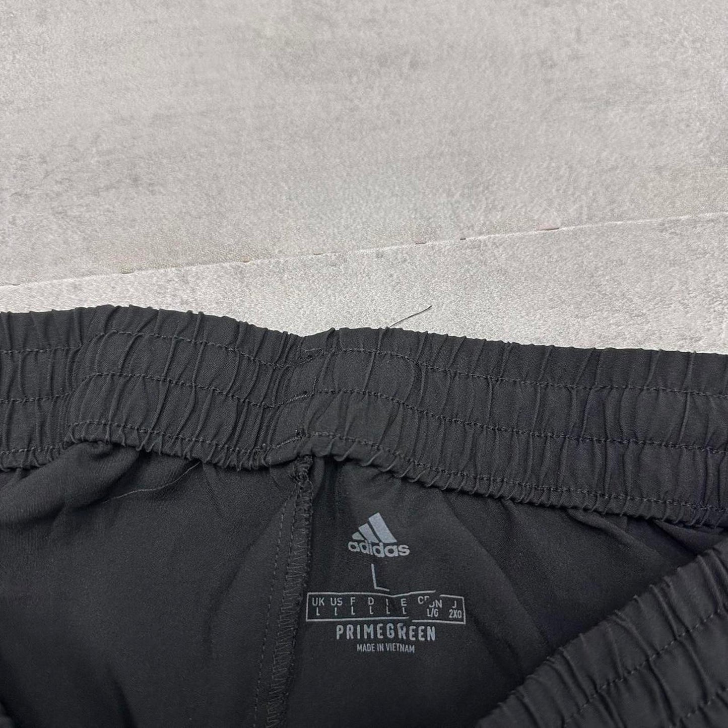 Adidas Trackies L black y2k track bottoms embroidered logo side stripe design