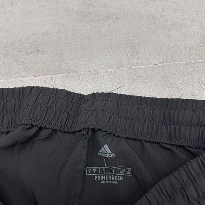 Adidas Trackies L black y2k track bottoms embroidered logo side stripe design