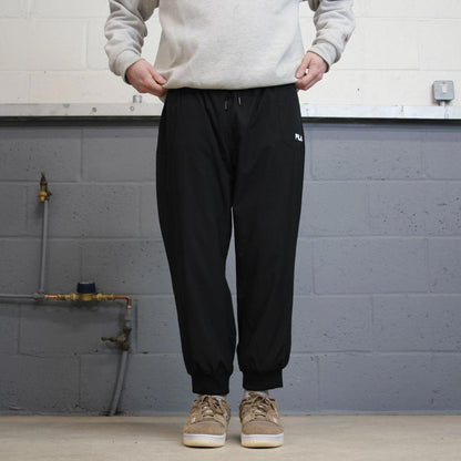 Black FILA trackies 16 loose y2k style joggers adjustable print logo track pants