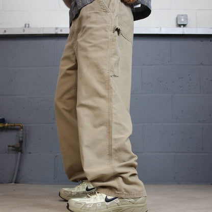 Tan baggy vintage Carhartt carpenter pants y2k Loose leg 2000s skater style workwear